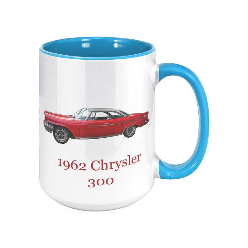 White ceramic mug with vintage 1962 Chrysler 300 photo and 'I'm not old, I'm classic!' quote. Reverse shows '1962 Chrysler 300' text. Options: black, blue, pink, or red handle/interior.