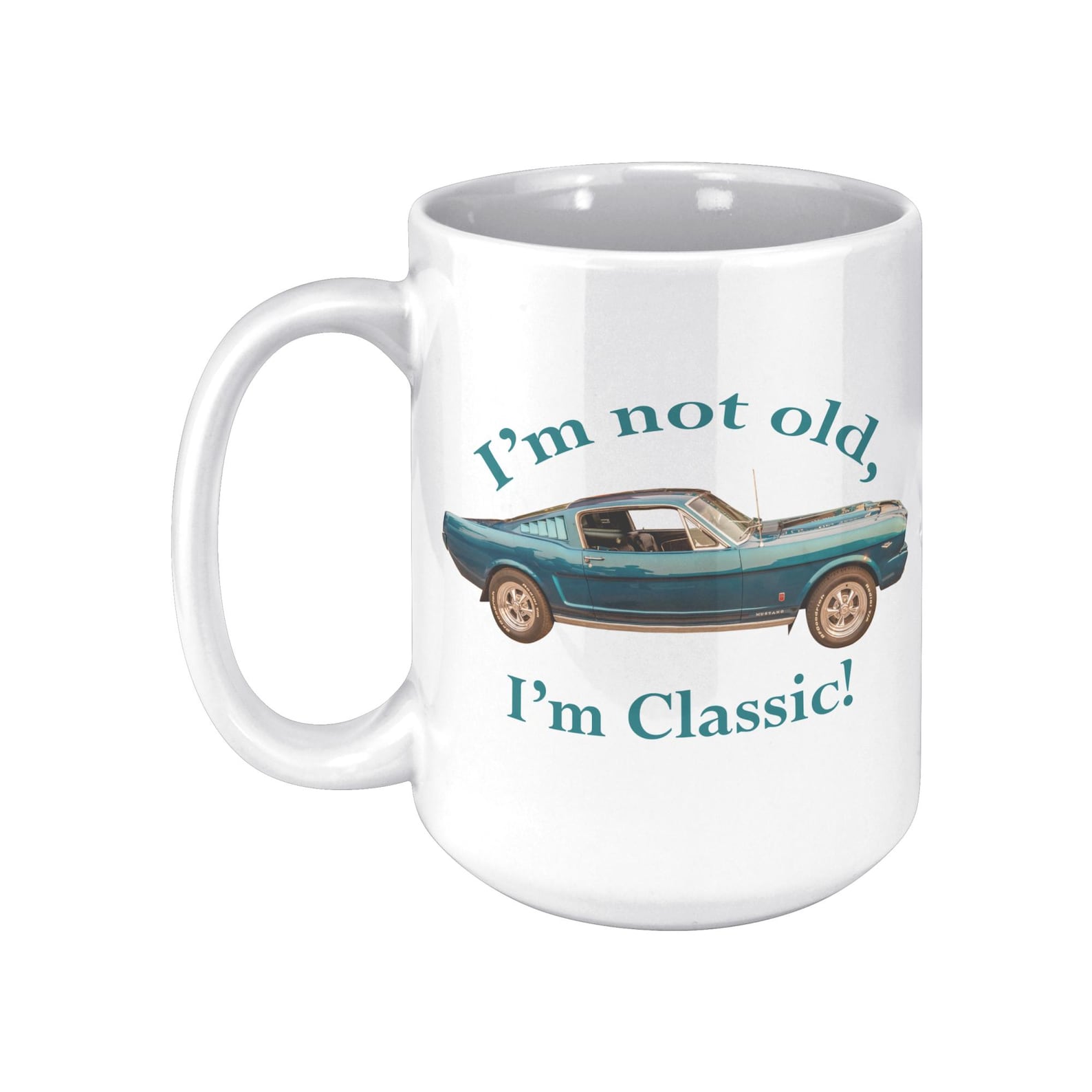 A 15 oz white ceramic mug showing a 1965 Mustang Fastback and the words "I'm not old, I'm Classic!"