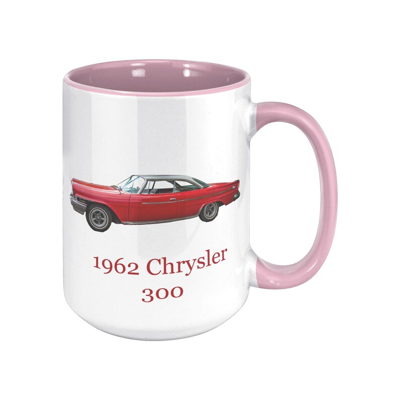 White ceramic mug with vintage 1962 Chrysler 300 photo and 'I'm not old, I'm classic!' quote. Reverse shows '1962 Chrysler 300' text. Options: black, blue, pink, or red handle/interior.