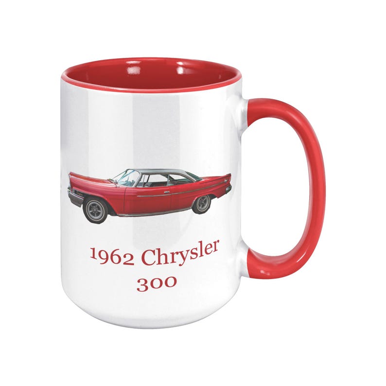 White ceramic mug with vintage 1962 Chrysler 300 photo and 'I'm not old, I'm classic!' quote. Reverse shows '1962 Chrysler 300' text. Options: black, blue, pink, or red handle/interior.