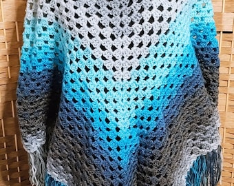 blue and gray crocheted poncho