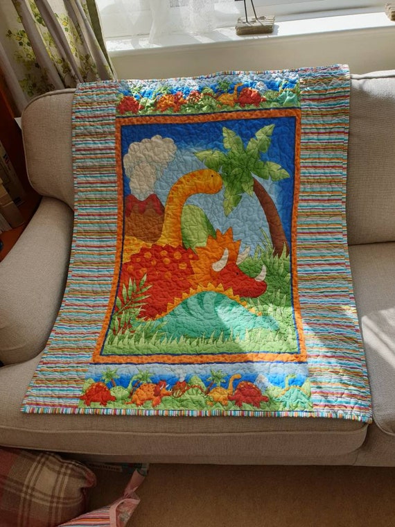 dinosaur cot quilt