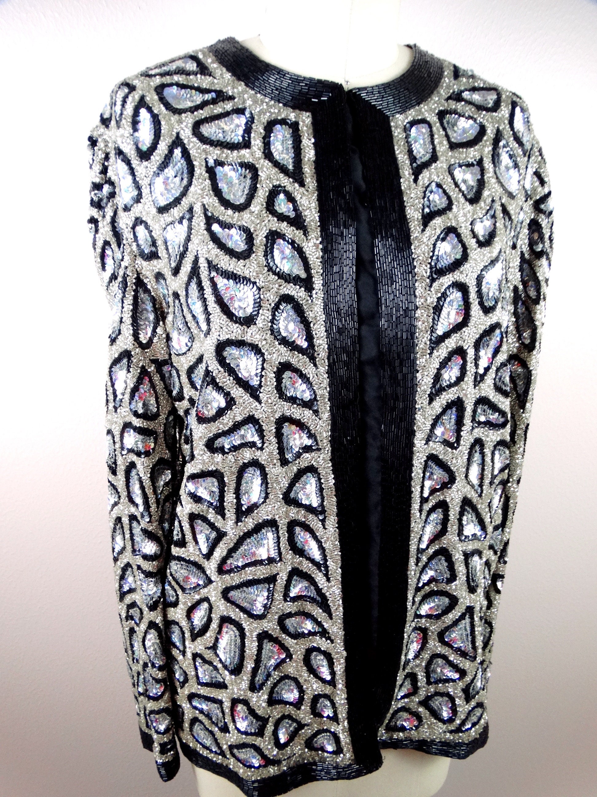 Incredible hand beaded @louisvuitton iridescent jacket from