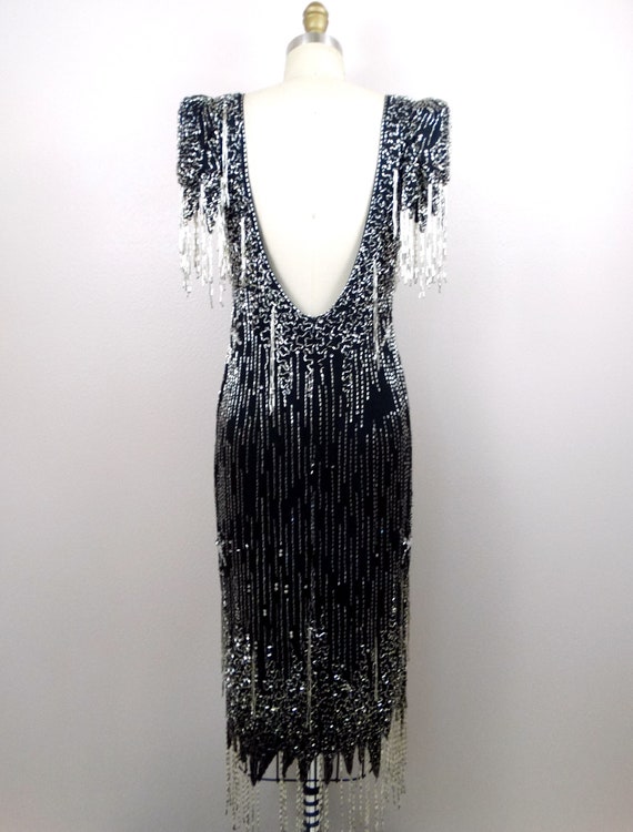 black dress with silver fringe Music City Magic Fringe Mini Dress in Black Curves