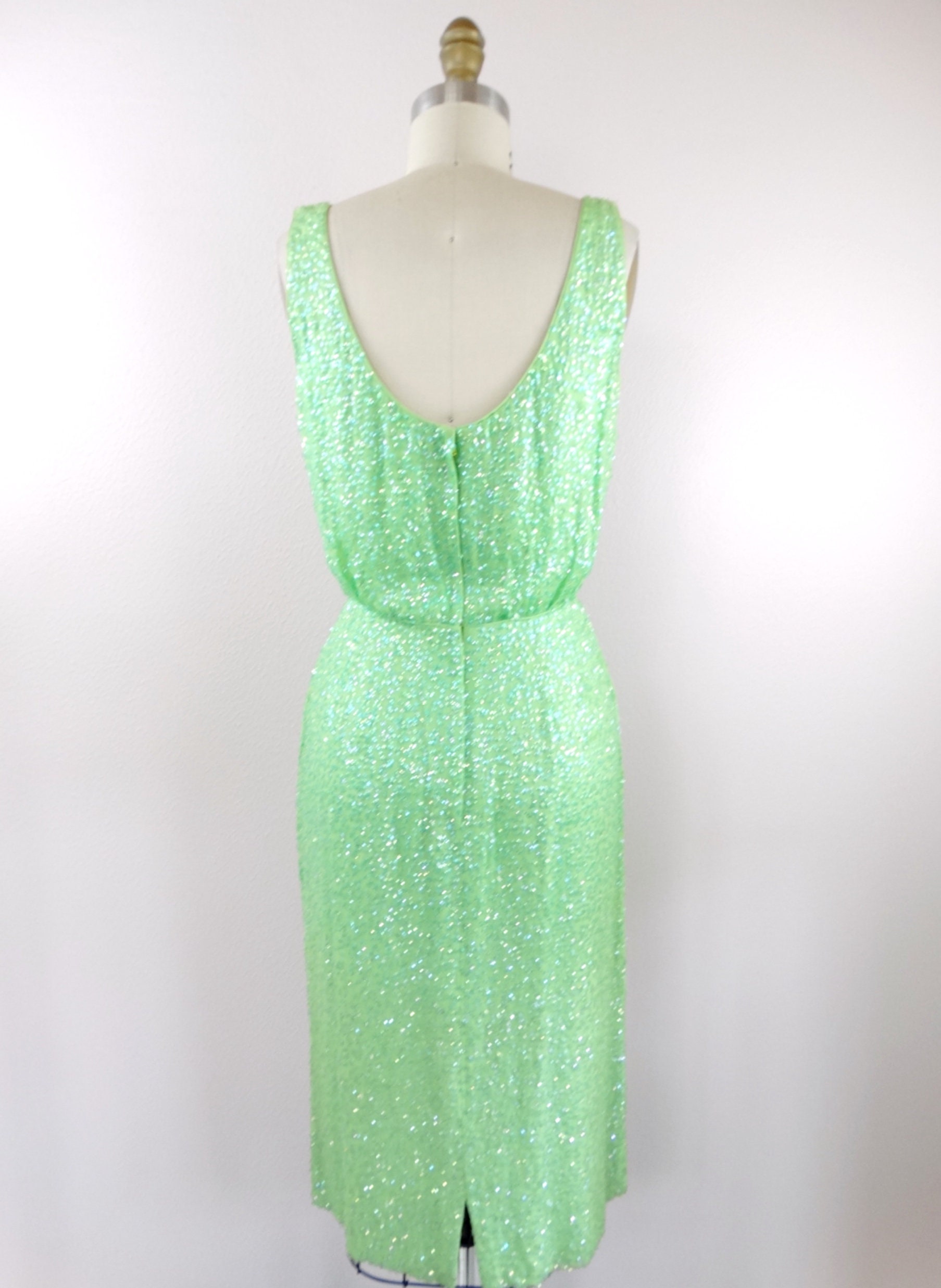 green emerald velvet dress Benia Mini Dress in Drape Sequin Lime Green main image 0