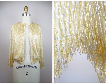 50er-Jahre-Pullover mit Fransen und Perlen / 1950er- und 1960er-Jahre-Strickjacke in Creme, Elfenbein, Silber und Gold / Vollperlenpullover
