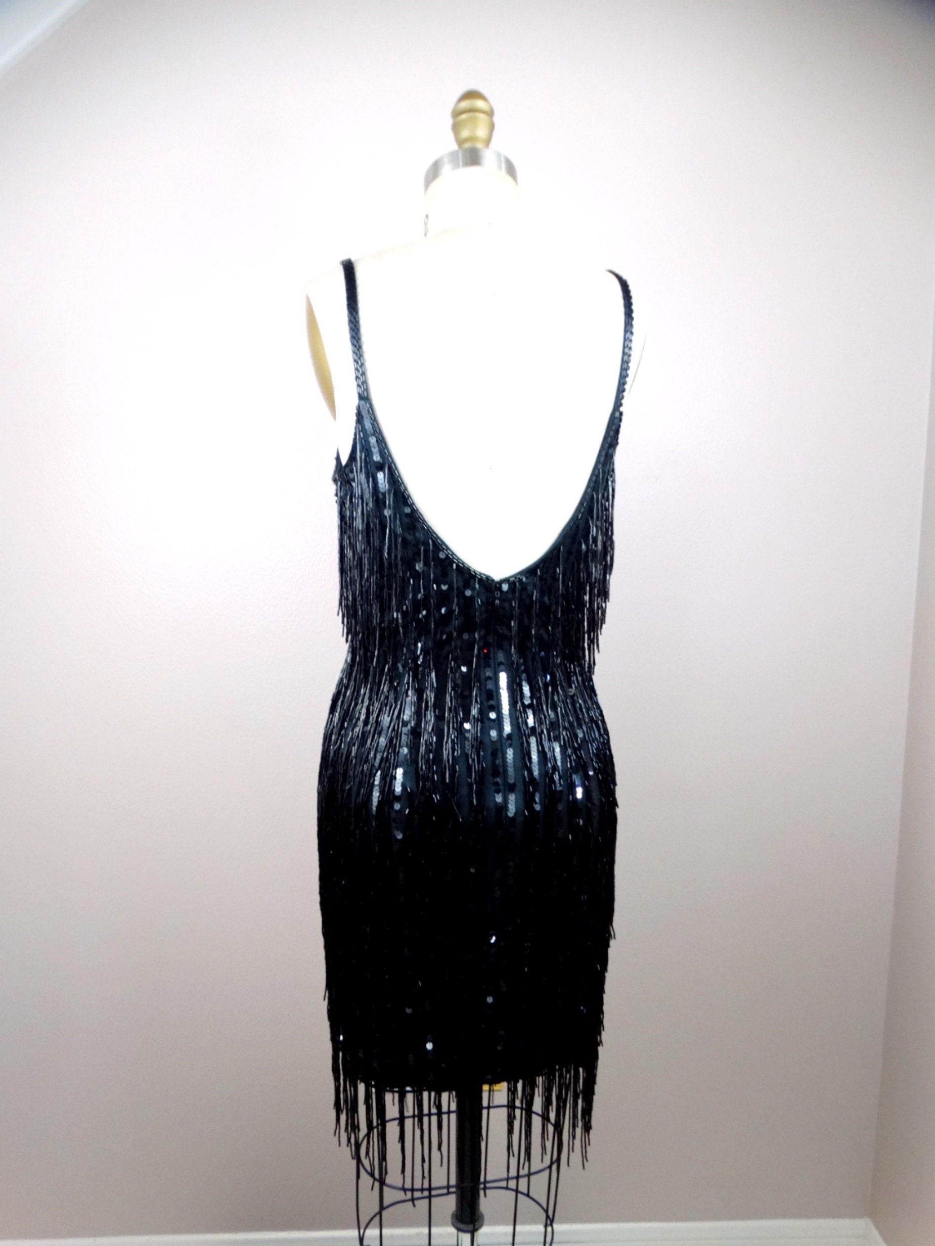 princess polly baby blue dress When you find the perfect party dress 🖤✨, This sequin fringe dress can be  worn as a strapless dress or it also comes with detachable spaghetti straps  if you prefer. It’s so perfect for the festive