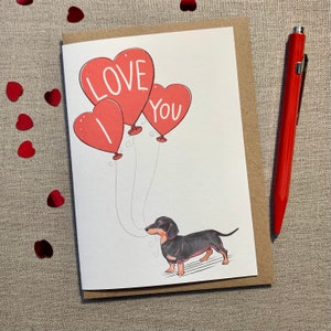 Tarjeta de San Valentín con texto "Te amo", de Dachshund