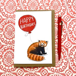 May include: A red panda holding a red balloon with the text "Happy Birthday" on it. The card is white with a brown border.