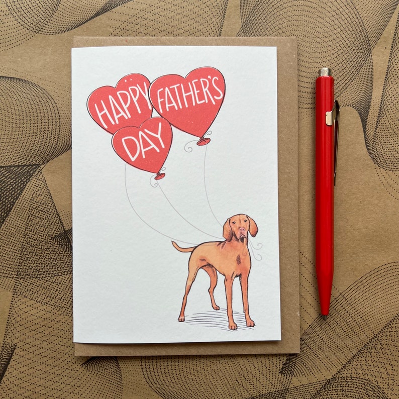 May include: A greeting card with a brown dog and three red heart-shaped balloons. The balloons have the text "Happy Father's Day" on them.