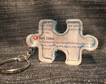 Dark Zodiac HHN 31 Map Puzzle Shaped Keychain