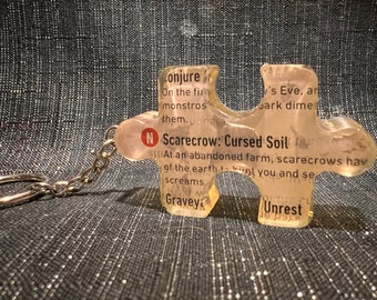 Scarecrow Cursed Soil HHN 31 Guide Map Keychain