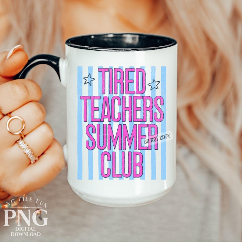 May include: White ceramic mug with a black handle and rim. The mug features the text "TIRED TEACHERS SUMMER CLUB" in pink and blue, with a blue striped background and star accents. The words "DO NOT COPY" are also visible.