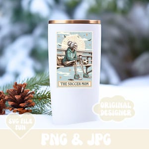 May include: White tumbler with a graphic of a skeleton wearing a blue hoodie and holding a soccer ball. The text "The Soccer Mom" is printed on the tumbler.