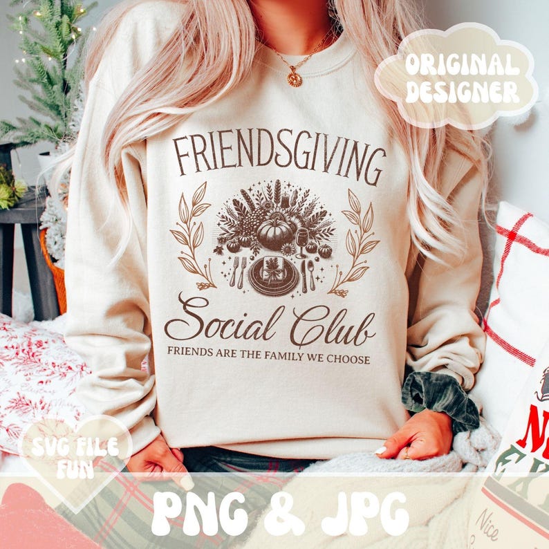 May include: Beige Friendsgiving Social Club sweatshirt with a brown graphic of a Thanksgiving feast. The text "FRIENDSGIVING Social Club" and "FRIENDS ARE THE FAMILY WE CHOOSE" are printed on the front. The image also includes the text "ORIGINAL DESIGNER", "SVG FILE FUN", and "PNG & JPG".