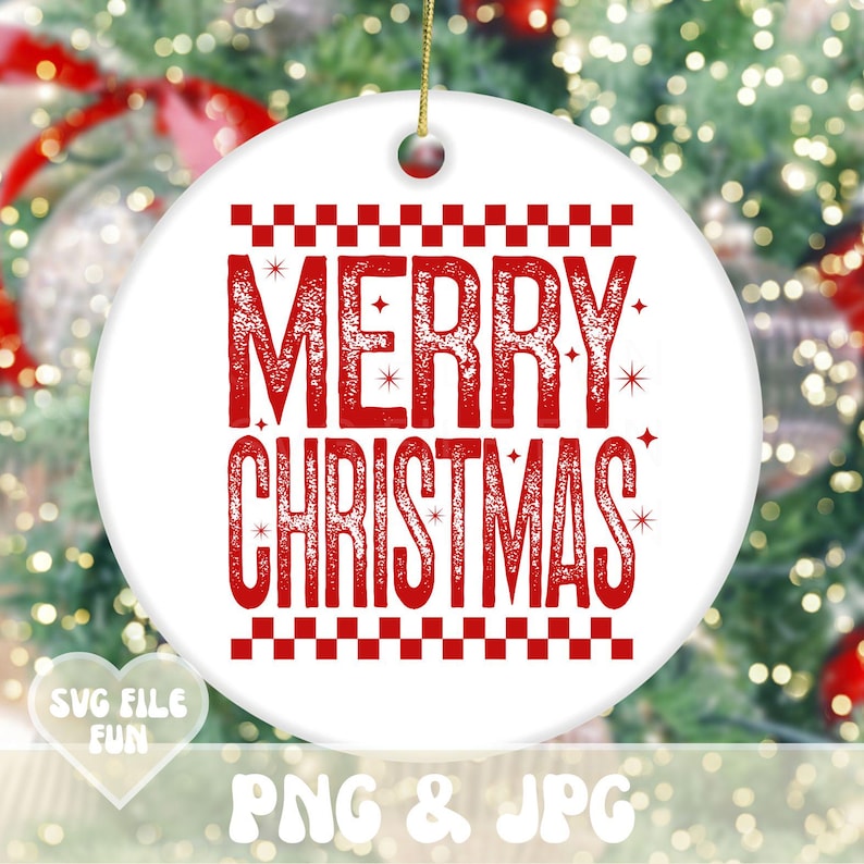 May include: Round white ceramic Christmas ornament with the words "MERRY CHRISTMAS" in red, with a decorative border. It has a gold string for hanging. The background is a blurred Christmas tree.