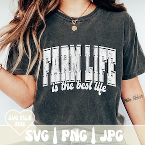 May include: A dark gray t-shirt with a white distressed graphic that reads "FARM LIFE is the best life".