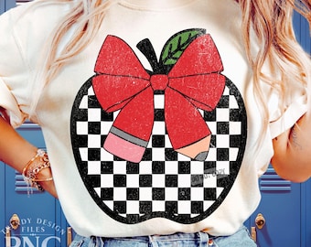 May include: Cream-colored sweatshirt featuring a distressed apple design with a red bow, green leaf, and two pencils. The apple has a black and white checkered pattern. The text "DO NOT COPY" is visible on the design. The bottom left corner has the text "TRENDY DESIGN FILES PNG DIGITAL DOWNLOAD".