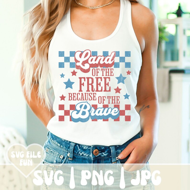 May include: White tank top with the text "Land of the Free Because of the Brave" in red and blue. The design includes stars and checkered patterns, perfect for patriotic celebrations.