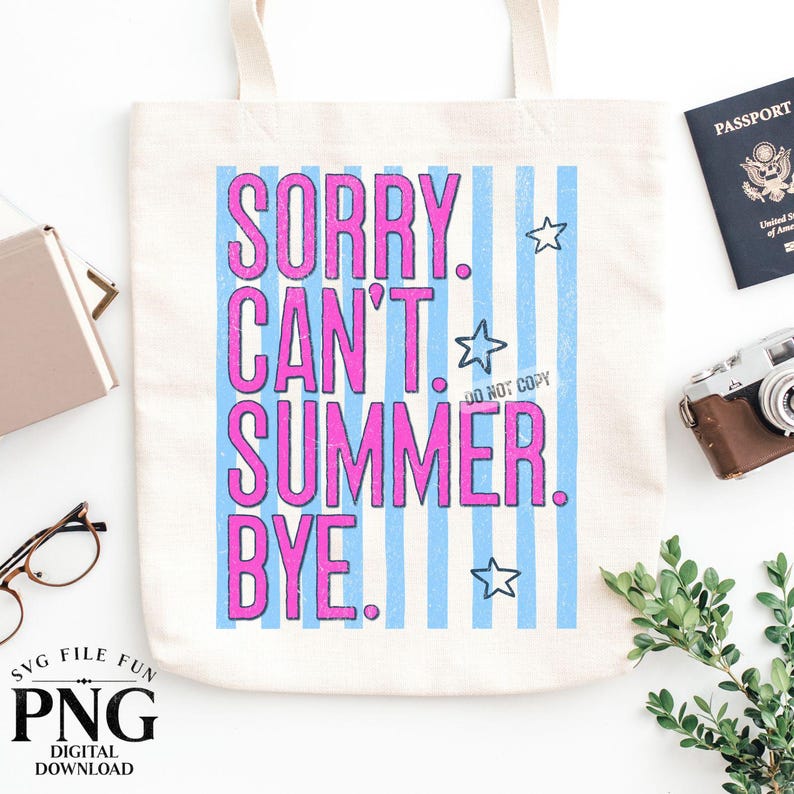 May include: A cream-colored tote bag with the text "SORRY. CAN'T. SUMMER. BYE." in pink letters, set against a blue striped background. The bag also features three white stars. A passport, camera, and greenery are also visible.