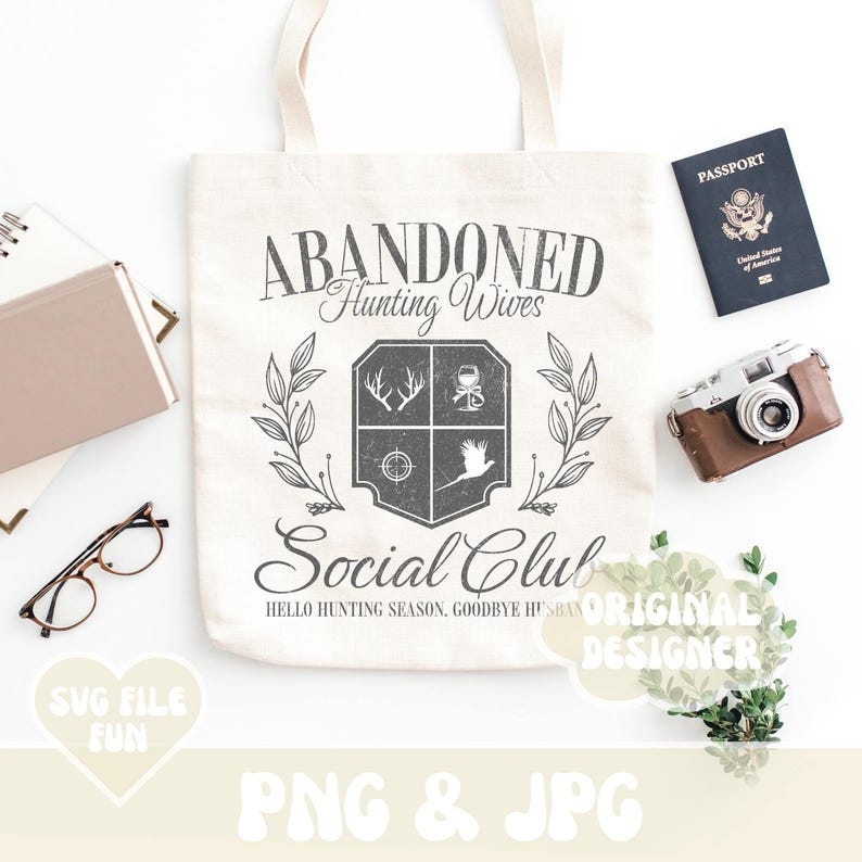 May include: A white tote bag featuring the text "Abandoned Hunting Wives Social Club" and a crest depicting a hunting scene. The text "Hello Hunting Season, Goodbye Husband" is also included.