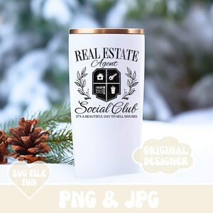 May include: White tumbler with a gold rim, featuring the text "REAL ESTATE Agent Social Club." The design includes a shield with house, key, and "SOLD" symbols, and the phrase "It's a beautiful day to sell houses."