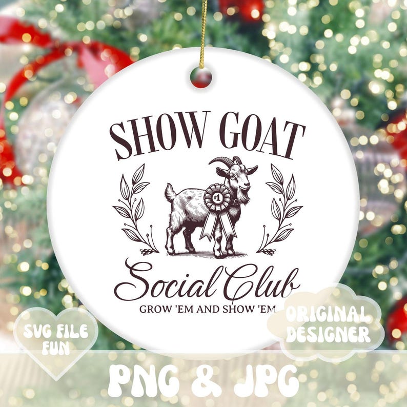 May include: White ceramic ornament with a brown illustration of a goat wearing a ribbon with the number one on it. The text "SHOW GOAT Social Club GROW 'EM AND SHOW 'EM ORIGINAL DESIGNER" is printed on the ornament.