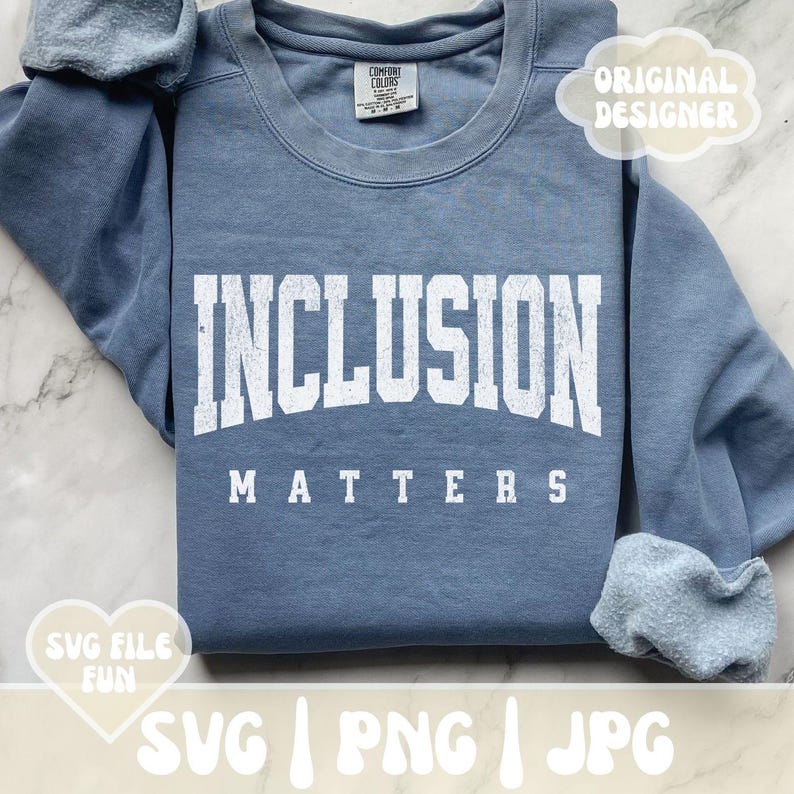 May include: A blue sweatshirt with the text "INCLUSION MATTERS" in white distressed lettering. The sweatshirt is a popular item for promoting inclusivity and diversity.
