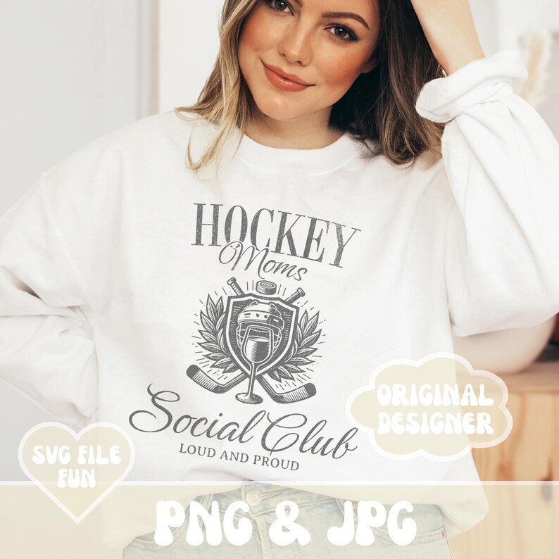 May include: A white sweatshirt with a gray graphic design that says "Hockey Moms Social Club Loud and Proud" with a hockey stick and helmet design. The text "Original Designer" is in a white cloud shape.