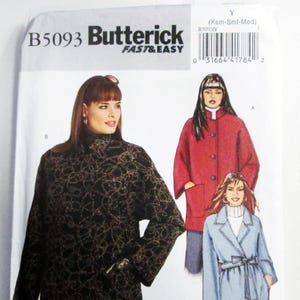May include: A Butterick sewing pattern, B5093, featuring illustrations of three different coat designs. The coats are in red, black, and light blue. The pattern includes the text "FAST & EASY" and size information.
