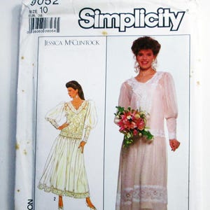 May include: Simplicity sewing pattern featuring designs by Jessica McClintock. The pattern includes illustrations of two different dresses, one with a long skirt and a detailed bodice, and the other with a lace-trimmed top and skirt. Size 10, EUR 38.