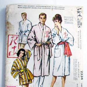 May include: Vintage McCall's pattern for monogram robes. The illustration shows various robes in different colors and patterns, including striped and solid designs. The pattern includes instructions for two lengths and shoulder seams, suitable for lounging or beachwear.