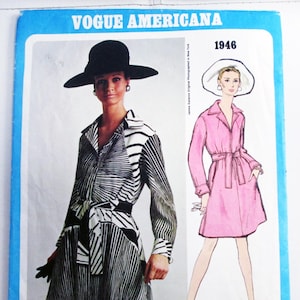 May include: Vintage Vogue Americana sewing pattern featuring a woman in a black and white striped dress and a wide-brimmed hat. The pattern also includes a pink coat design. The text "Vogue Americana", "1946", and "James Galanos" are visible.