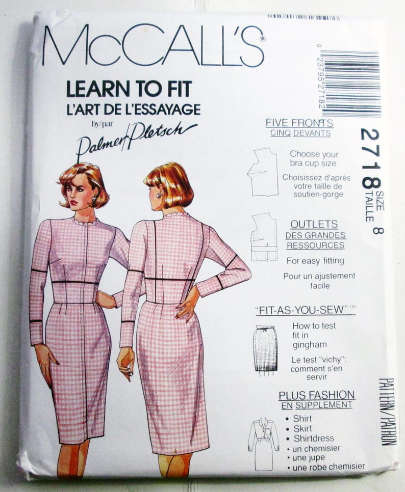 May include: A McCall's Learn to Fit sewing pattern envelope, size 8, featuring illustrations of a pink and white gingham dress. The text includes 'L'Art de l'Essayage', 'Palmer/Pletsch', 'Five Fronts', 'Outlets', 'Fit-As-You-Sew', and 'Plus Fashion'.