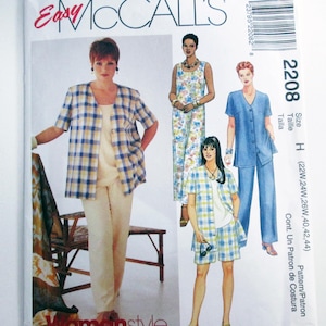 May include: A McCall's sewing pattern envelope featuring illustrations of women's clothing. The designs include a plaid jacket and shorts set, a floral jumpsuit, and a blue pantsuit. The text "Easy McCall's" and "Womanstyle" are visible.