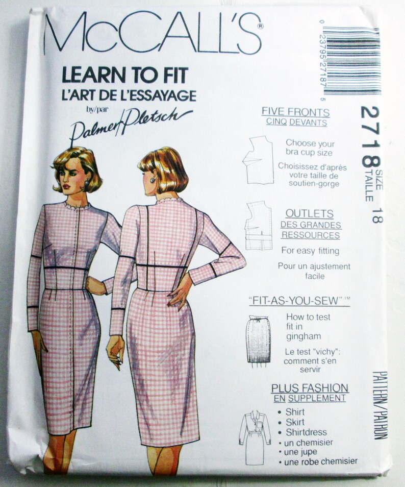 May include: McCall's Learn to Fit sewing pattern 2718, size 18. The envelope features illustrations of a long-sleeved, pink and white gingham dress with a high neckline and dark trim. Text includes instructions for bra cup sizing and fit testing.