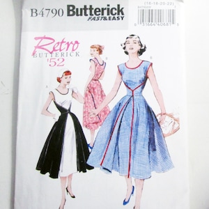 May include: Butterick B4790 sewing pattern featuring retro dress designs. The pattern includes illustrations of dresses in black and white, pink, and blue with red trim. The text "Retro Butterick '52" is visible.