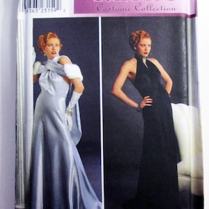 May include: Simplicity Retro Costume Collection sewing pattern. The pattern features two vintage dress designs. One dress is a long, light blue gown with a bow and fur accents. The other is a black halter dress. The pattern is for sizes 38-42.