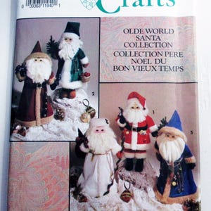 May include: Simplicity Crafts pattern featuring an Olde World Santa Collection. The image showcases various Santa Claus figures in different outfits, including a red suit, a blue robe, and a green coat. The pattern is one size.