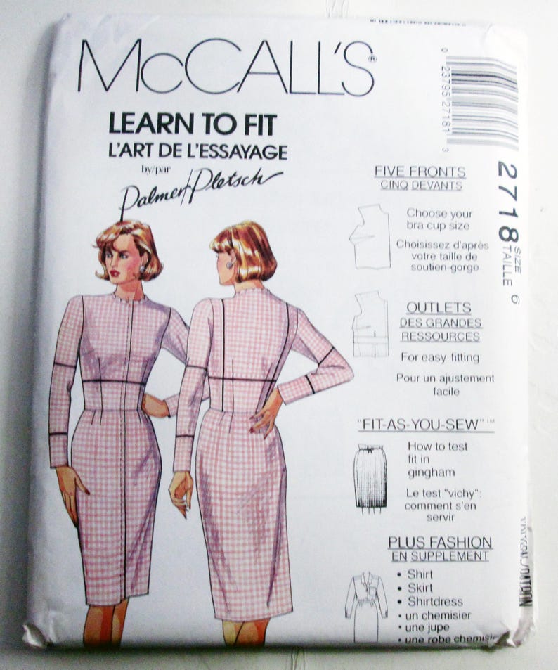 May include: A McCall's Learn to Fit sewing pattern envelope, number 2718, size 6. The front features illustrations of a dress in a pink and white gingham check pattern, along with instructional text for fitting, including bra cup size and testing fit.
