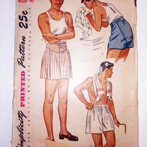 May include: Vintage Simplicity pattern from 1960 featuring illustrations of men's summer clothing. The pattern includes designs for shorts and a striped skirt-like garment. The text on the pattern reads "Waist 40" and "Printed Pattern 25¢".