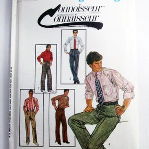 May include: A Simplicity 6668 sewing pattern envelope for trousers and shirts. The cover features illustrations of four different outfits with various shirt and pant combinations. The text includes "Simplicity", "Connoisseur Collection", and "Waist 32".
