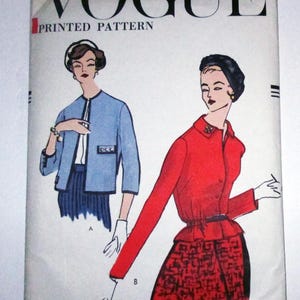 May include: Vintage Vogue printed pattern featuring illustrations of two women in stylish outfits. The pattern includes the text "VOGUE PRINTED PATTERN" and size information. The cover has a retro aesthetic, showcasing classic fashion designs.