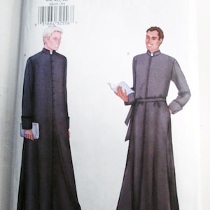 May include: Butterick sewing pattern 6844 features illustrations of two long, dark gray robes with white collars. The pattern includes sizes 44, 46, and 48. The Butterick logo is at the top.
