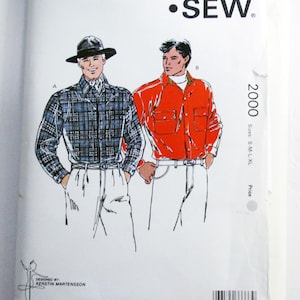 May include: A vintage Kwik Sew sewing pattern packet, pattern 2000, featuring illustrations of two men's shirts. One shirt is a blue plaid, the other is a solid orange. The packet includes the sizes S-M-L-XL.