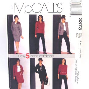 May include: A McCall's sewing pattern featuring a 5-piece wardrobe. The pattern includes images of women in various outfits, including suits, skirts, and pantsuits. The pattern number is 3373.