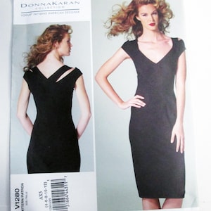 May include: A black dress pattern by Donna Karan. The pattern features a V-neck dress with shoulder cutouts. The pattern includes the text "V1280" and "AX5 (4-6-8-10-12)". The Vogue Patterns American Designer collection is also visible.