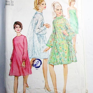 May include: Vintage Simplicity sewing pattern, number 7148, featuring illustrations of four different dresses. The pattern includes a pink dress, a blue lace dress, a green patterned dress, and a green strapless dress. The package is slightly worn.