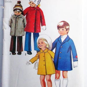 May include: A Simplicity 9903 sewing pattern envelope for children's coats, featuring illustrations of four children wearing various coats, hats, and knee-high socks. The text includes 9903, Simplicity, 85c, 95c, Size 6x, and Breast 25 1/2.