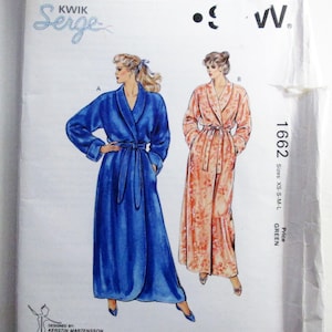 May include: A Kwik Sew pattern envelope 1662 for sizes XS-S-M-L. The front shows illustrations of two floor-length robes with tie belts. One robe is solid blue, and the other is a peach-colored floral print. Text includes Pattern 1662, Kwik Serge, and Kwik Sew Pattern Co., Inc.